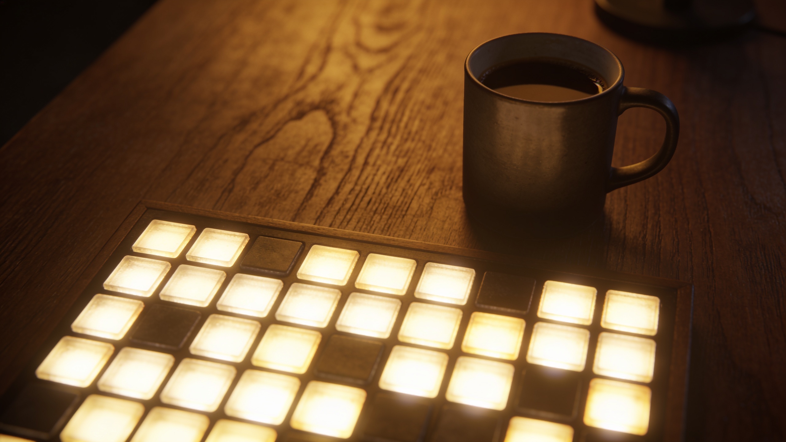 A grid of glowing tiles projected onto a desk