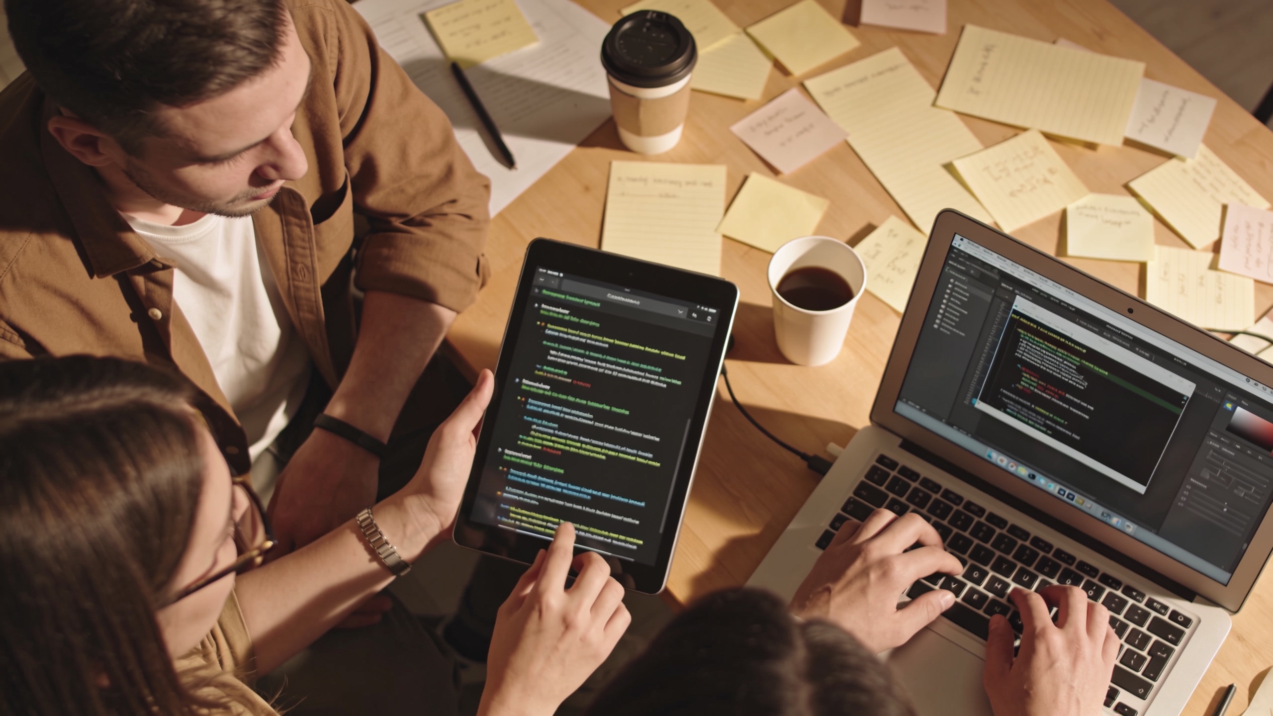 Team reviewing captions on a tablet while exporting video.