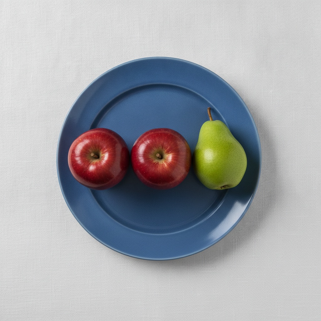 Nano Banana: Three red apples and one green pear arranged in a single row on a blue plate, top-down view, white tablecloth