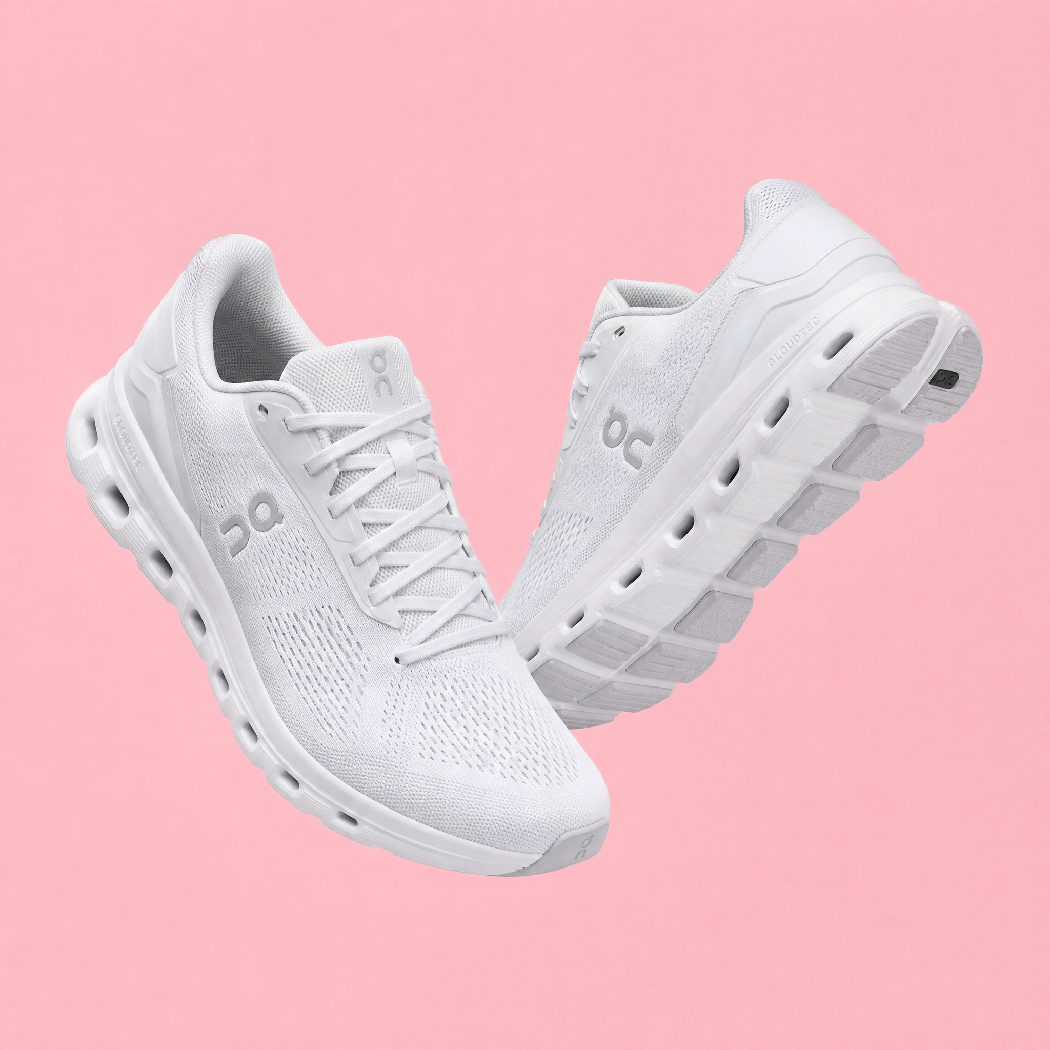 GPT-Image 1.5: A pair of white running shoes floating mid-air over a pastel pink background, even studio lighting, catalogue shot