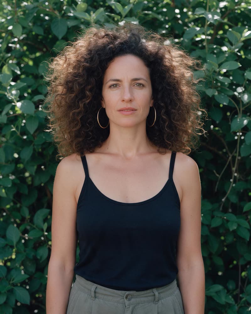 Curly hair against foliage: original